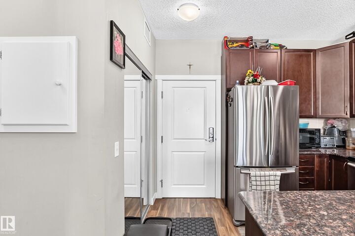 Property Photo:  12804 140 Avenue NW 404  AB T6V 0M3 