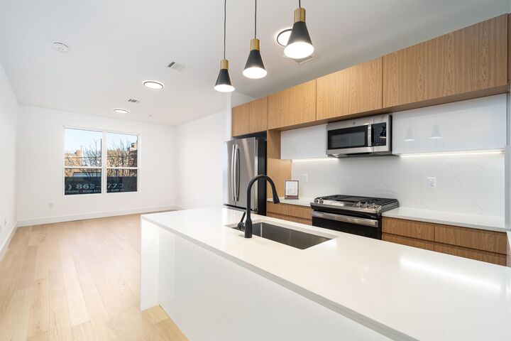 Property Photo:  649 38th St 211  NJ 07086 