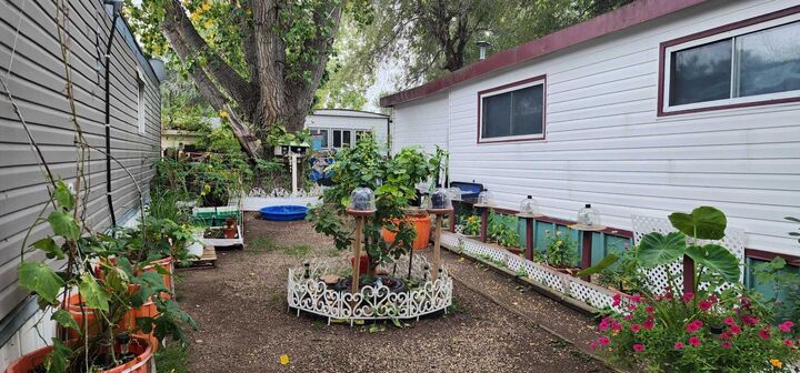 Property Photo:  59 Greenbrook  Mobile Village  AB T1R 0R7 