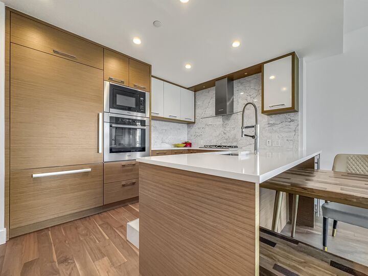Property Photo:  4360 Beresford Street 17xx  BC V5H 0G2 