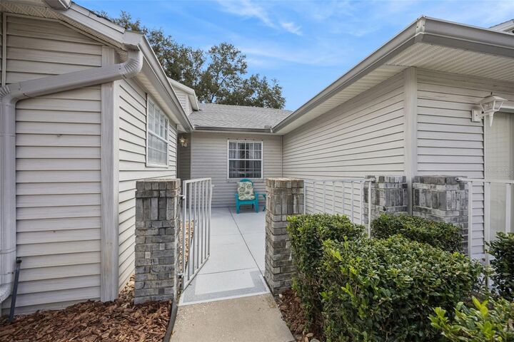 Property Photo:  26032 Newcombe Circle  FL 34748 