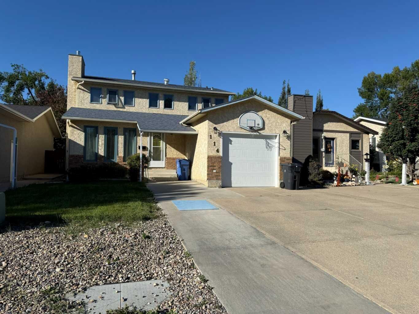 Property Photo: 114 Red Crow Boulevard W AB T1K 5M1