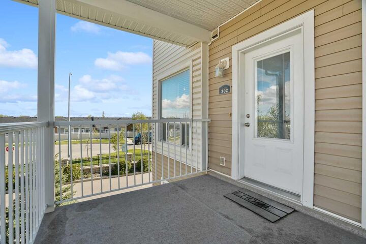 Property Photo: 302 Sunrise Terrace NE AB T1V 0C3