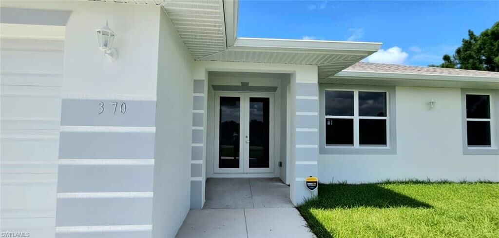 Property Photo:  370 Chalet Ave S  FL 33974 