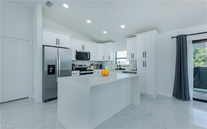 Property Photo:  416 NW 25th Ave  FL 33993 