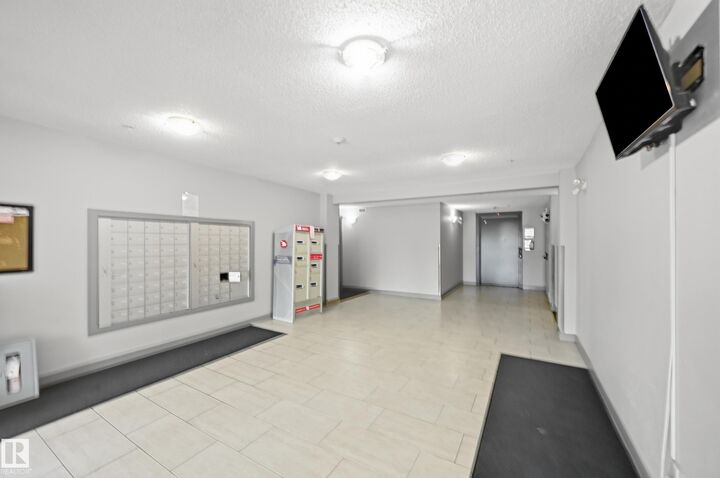 Property Photo:  11804 22 Avenue SW 215  AB T6W 2A2 