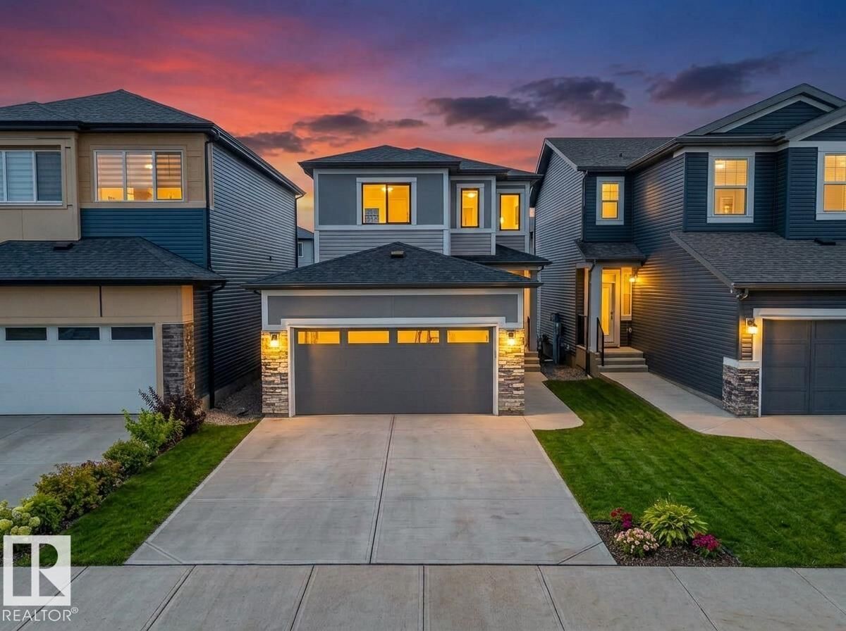 Property Photo:  7122 52 Ave Beaumont  AB T4X 2Z8 