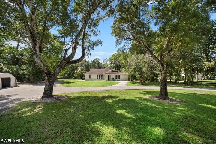 Property Photo:  5750 Westport Lane  FL 34116 