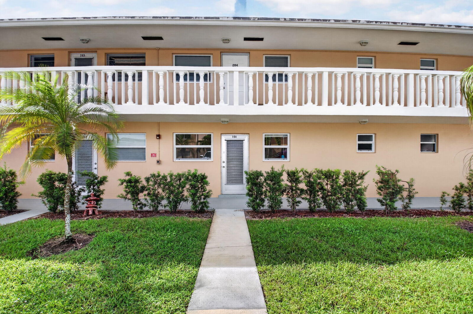 Property Photo: 2192 NE 1st Way 104 FL 33435