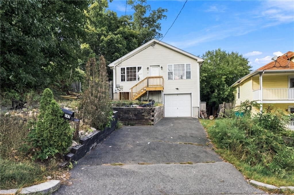 Property Photo:  147 Mount Saint Charles Avenue  RI 02895 