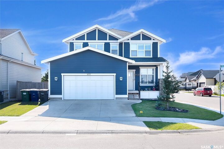 Property Photo:  402 Meadows Boulevard  SK S7V 0E7 