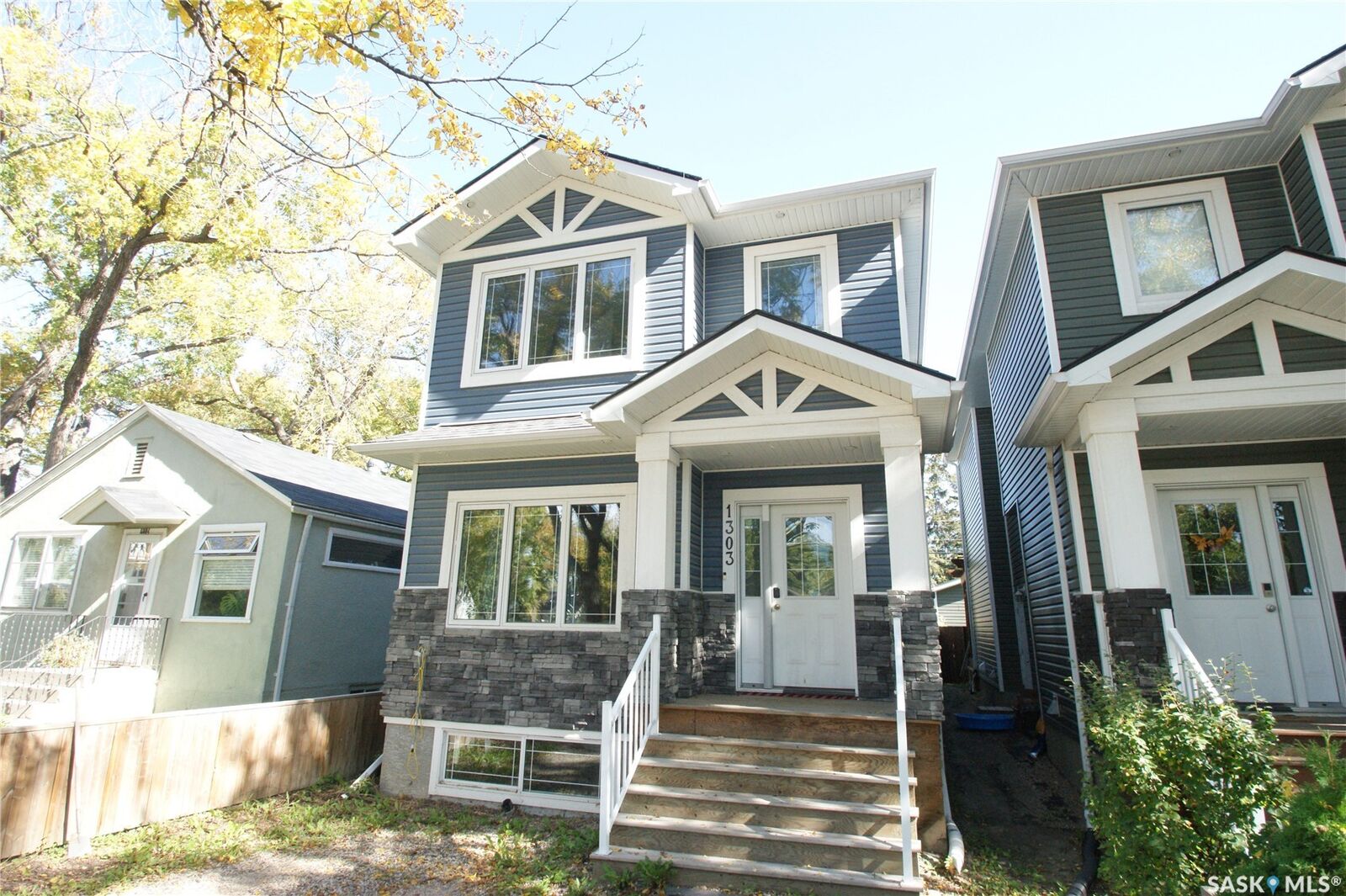 Property Photo:  1303A Broadway Avenue  SK S7H 2A5 