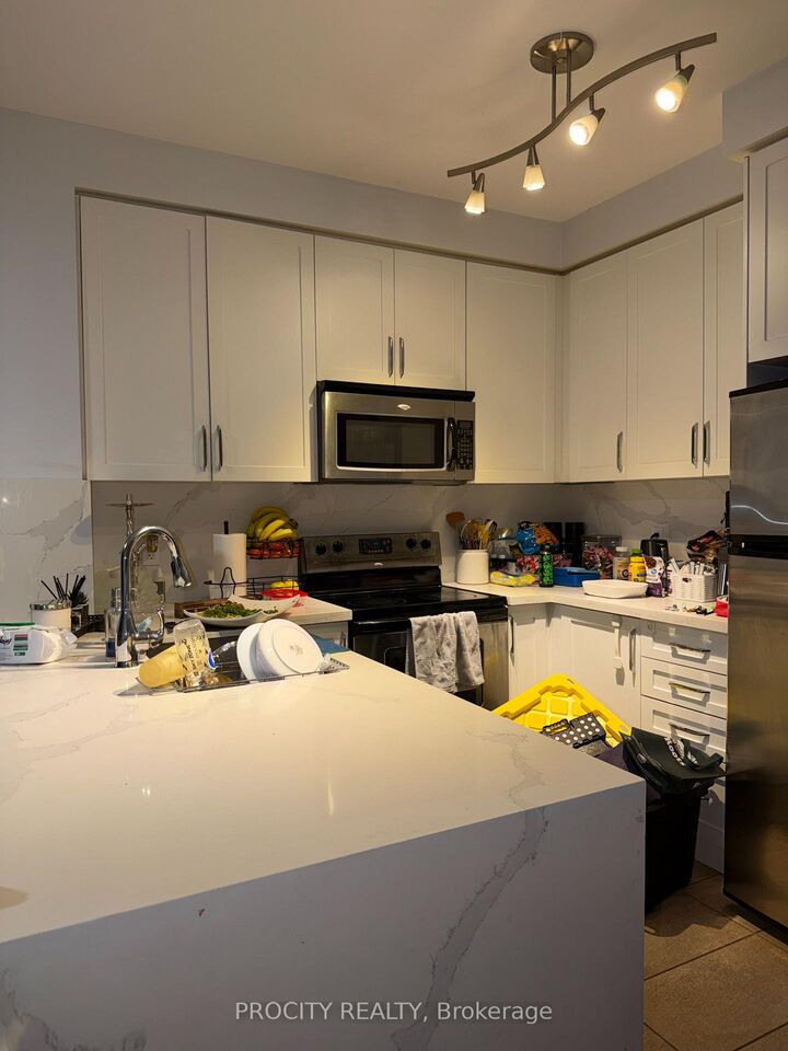 Property Photo:  9235 Jane Street 203  ON L6A 0J8 