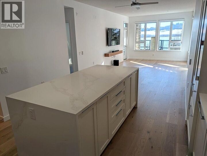 Property Photo:  3873 Cates Landing Way 102  BC V7G 0A6 