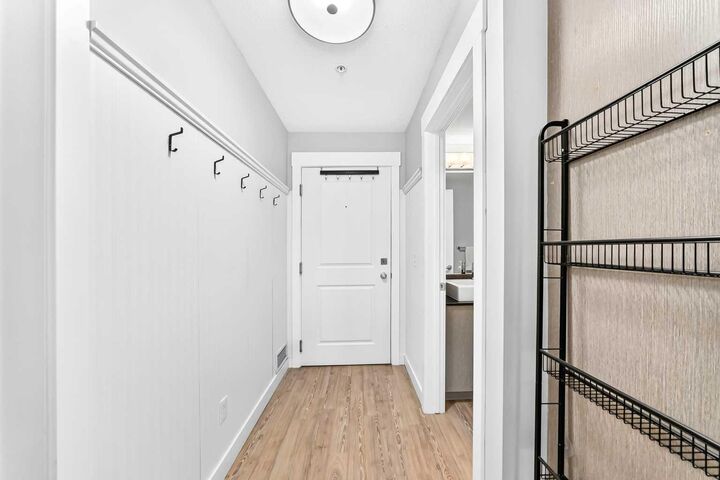 Property Photo:  11 Mahogany Row SE 1115  AB T3M 2L6 