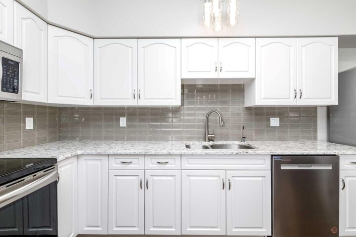 Property Photo:  5590 45 Street 302  AB T4N 7C4 