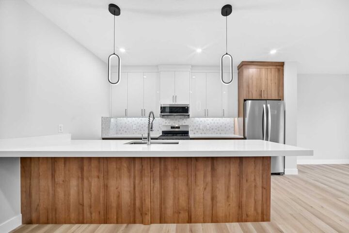 Property Photo:  1212 Waterford Drive  AB T1X 3A1 