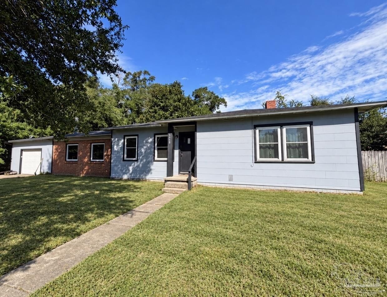 Property Photo:  6668 Maple St  FL 32570 