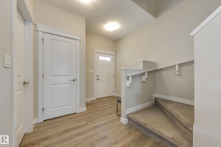 Property Photo:  9932 223 Street NW  AB T5T 7L7 