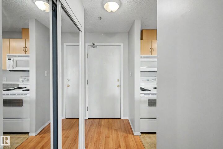 Property Photo:  2430 Guardian Road NW 204  AB T5T 6X9 