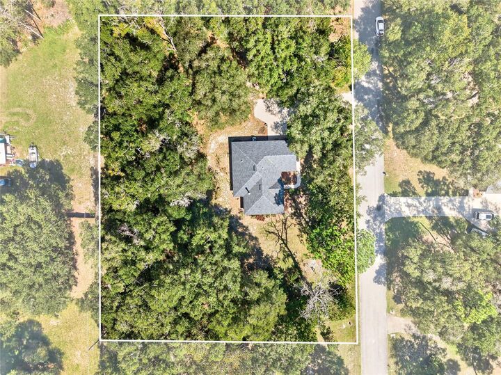 Property Photo:  10006 SW 90th Street  FL 32608 