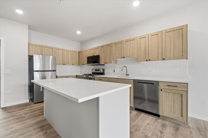 Property Photo: 302 Miller Drive A IL 60542