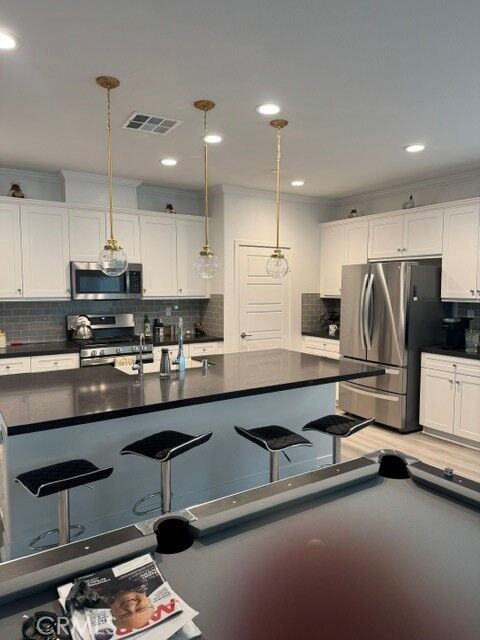 Property Photo:  1661 Village Green  CA 92223 