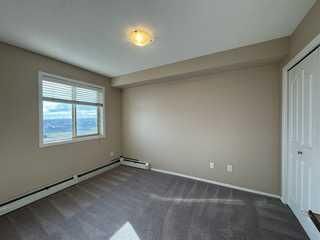 Property Photo:  7130 80 Avenue NE 404  AB T3J 0N5 