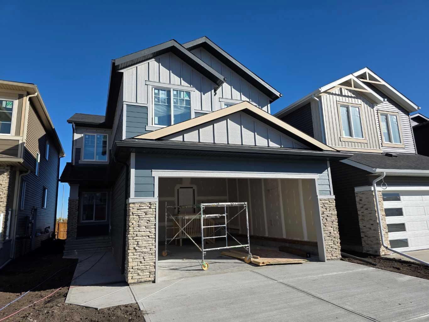 Property Photo:  280 Belmont Place SW  AB T2X 6E7 