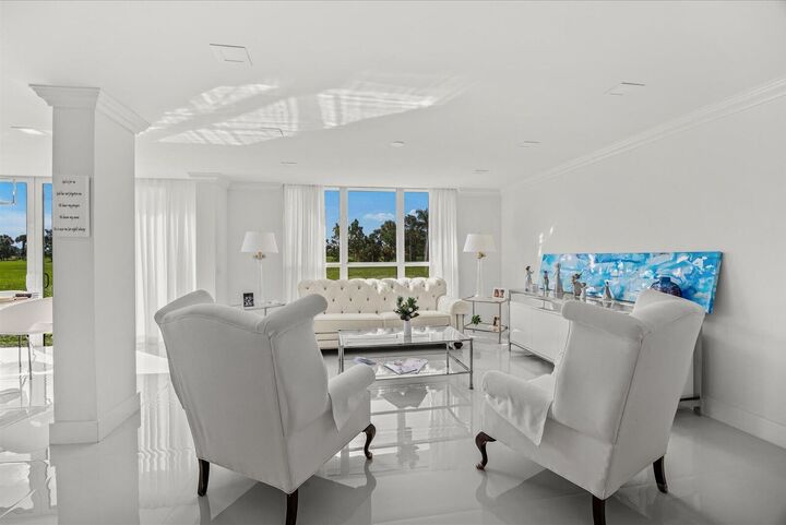 Property Photo:  5390 Woodland Lakes Drive 105  FL 33418 