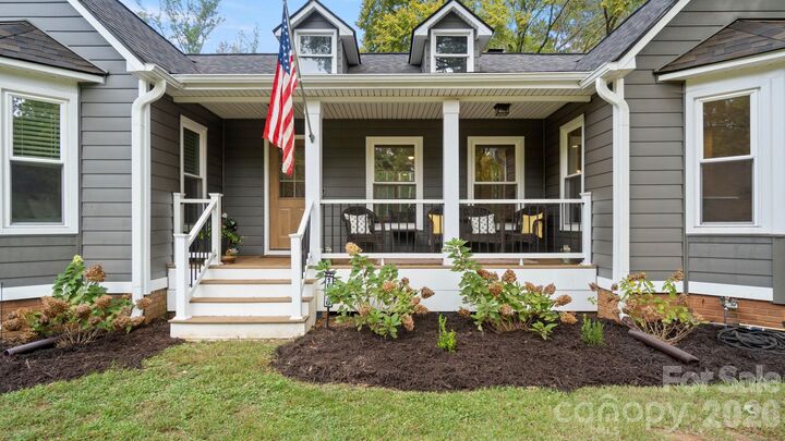 Property Photo: 10930 Beatties Ford Road NC 28078