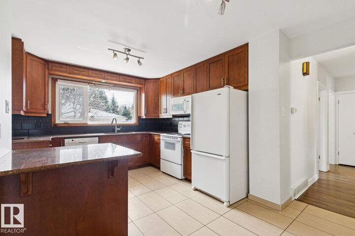 Property Photo:  11451 48 Av NW  AB T6H 0C9 