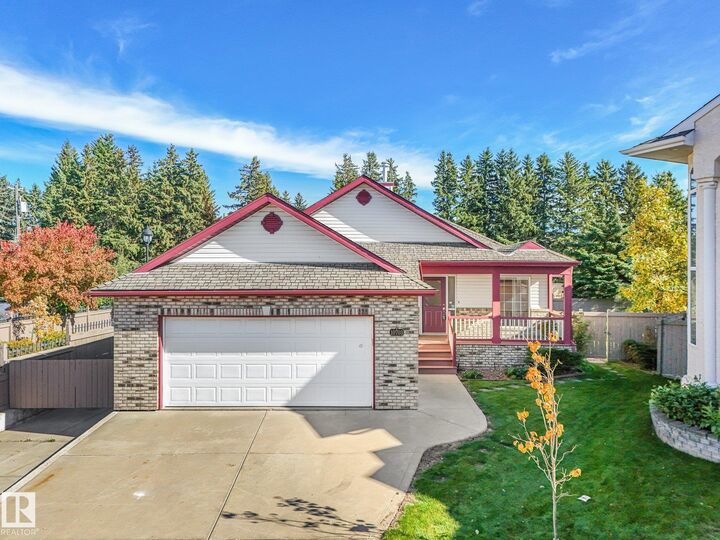 Property Photo:  10703 6 Avenue SW  AB T6W 1G3 