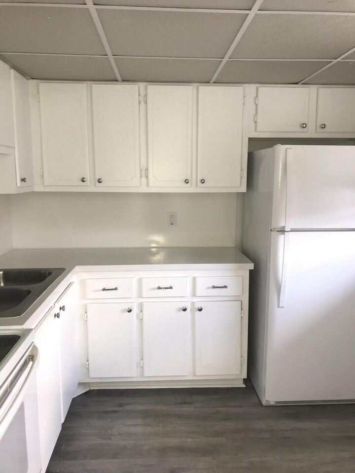 Property Photo: 2102 NE 1st Way 104 FL 33435