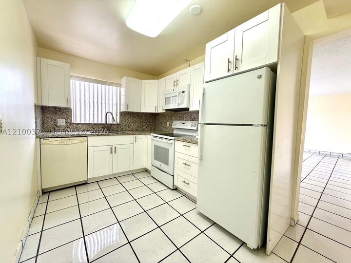 Property Photo:  7765 SW 86th St F2-402  FL 33143 