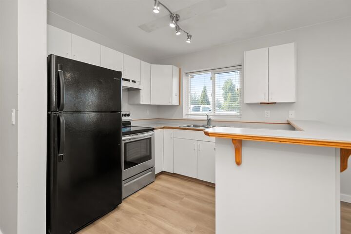 Property Photo:  9206 Corbould Street 1  BC V2P 4A5 
