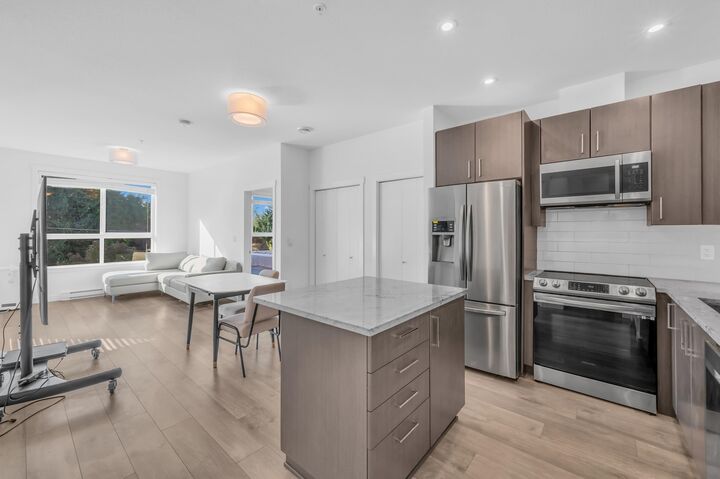 Property Photo:  20362 72B Avenue 309  BC V2Y 5K4 