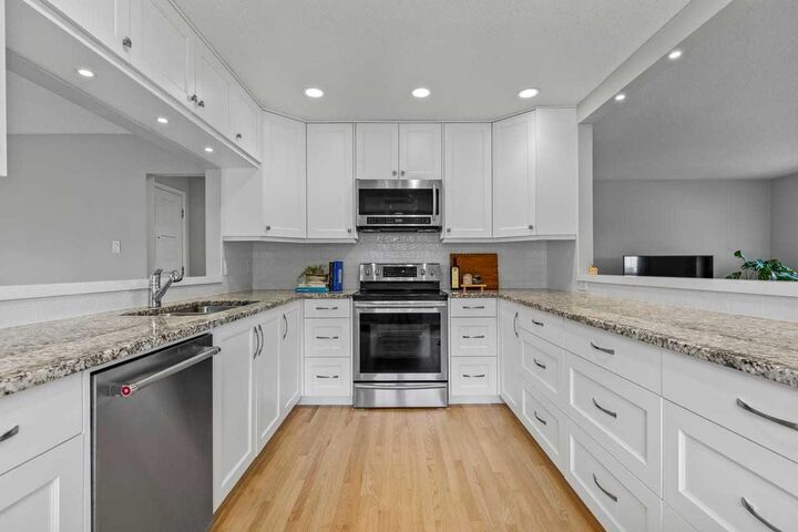 Property Photo:  232 Lake Wapta Rise SE  AB T2J 2M9 