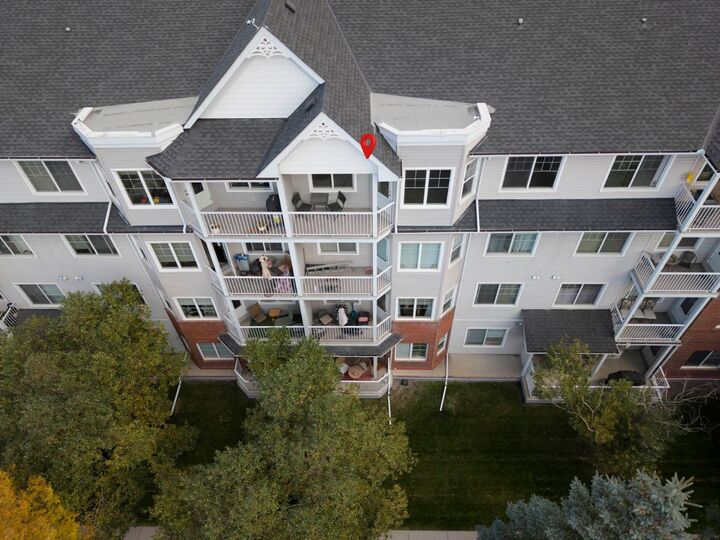 Property Photo:  8 Prestwick Pond Terrace SE 409  AB T2Z 4P3 