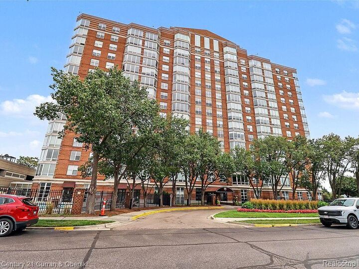 Property Photo: 250 E Harbortown Drive 307 MI 48207