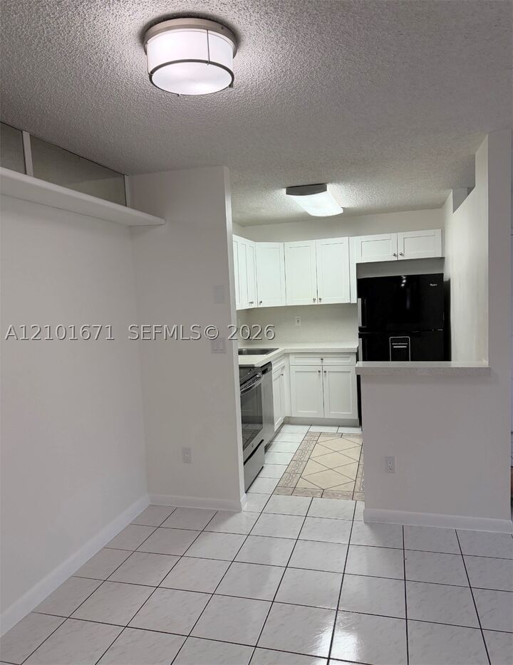 Property Photo:  4690 NW 102nd Ave 103-24  FL 33178 