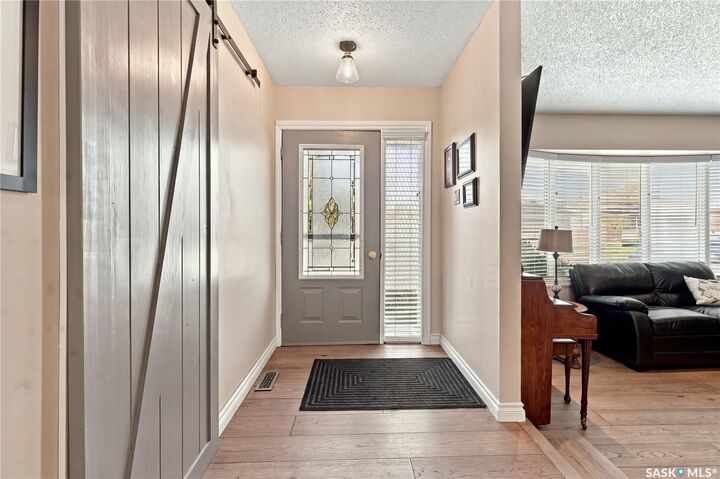 Property Photo:  222 Smith Road  SK S7M 4Z5 