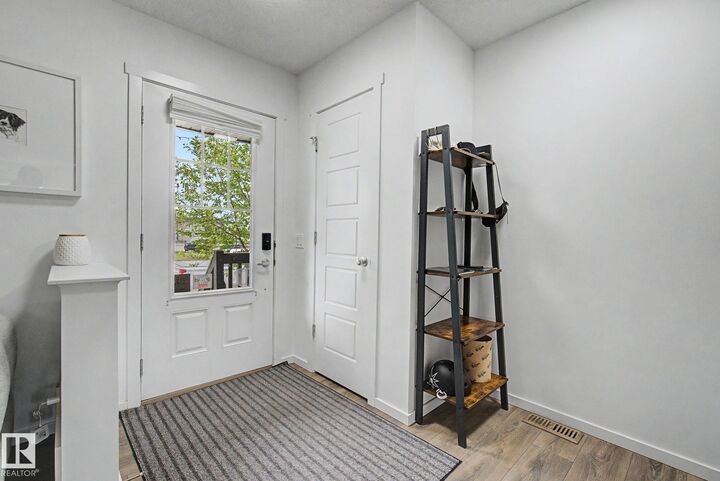 Property Photo:  385 Orchards Boulevard SW  AB T6X 2E1 