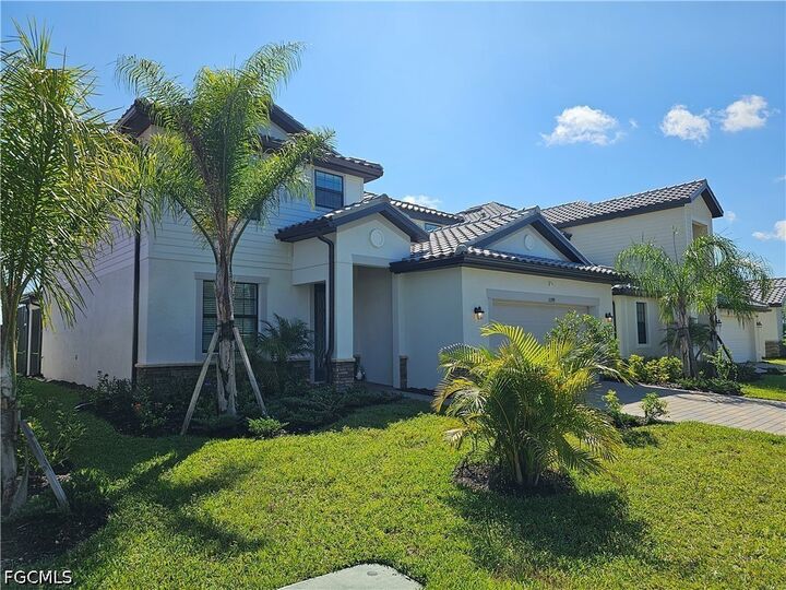 Property Photo: 11299 Shady Blossom Drive FL 33913