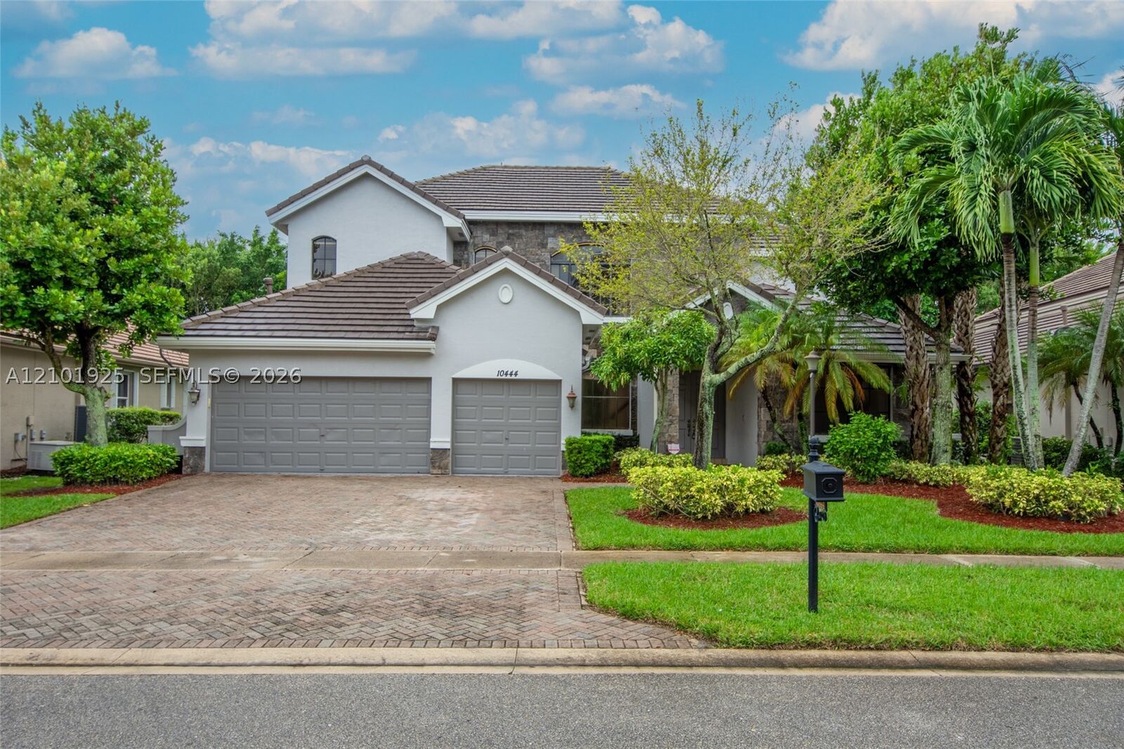 Property Photo: 10444 Trianon Pl FL 33449
