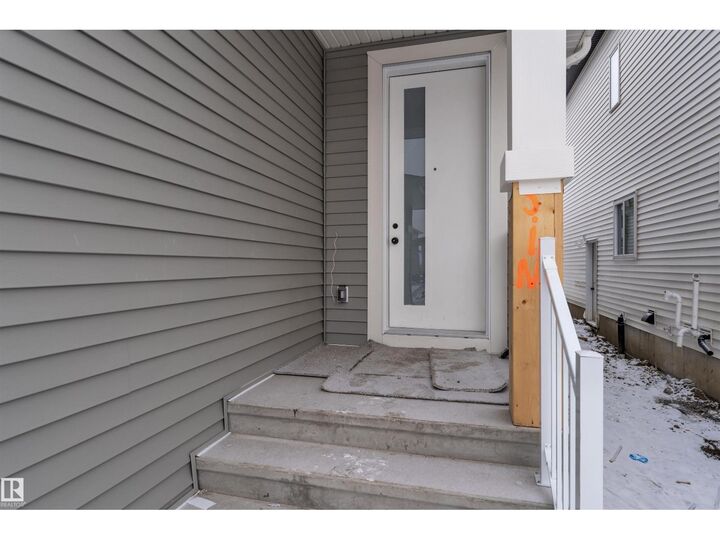 Property Photo:  209 Basin Co  AB T9E 1T6 