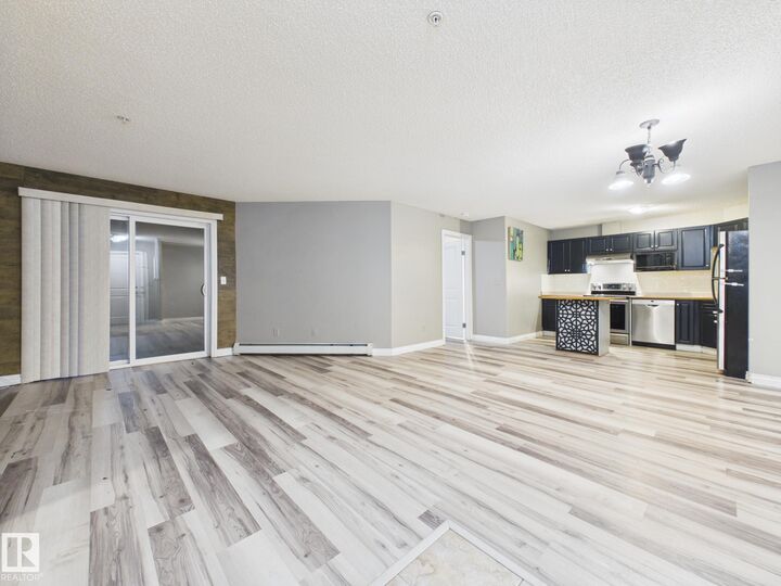 Property Photo:  16221 95 Street NW 102  AB T5Z 3V3 