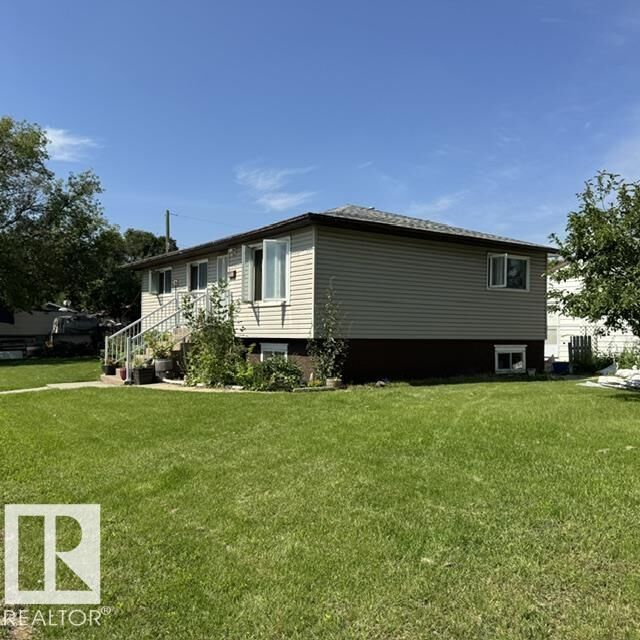 Property Photo:  11404 127 Avenue NW  AB T5E 0C6 