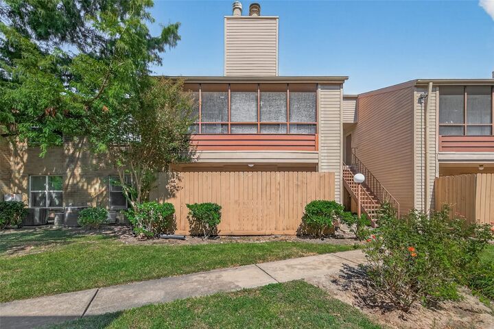 Property Photo: 10555 Turtlewood Court 210 TX 77072