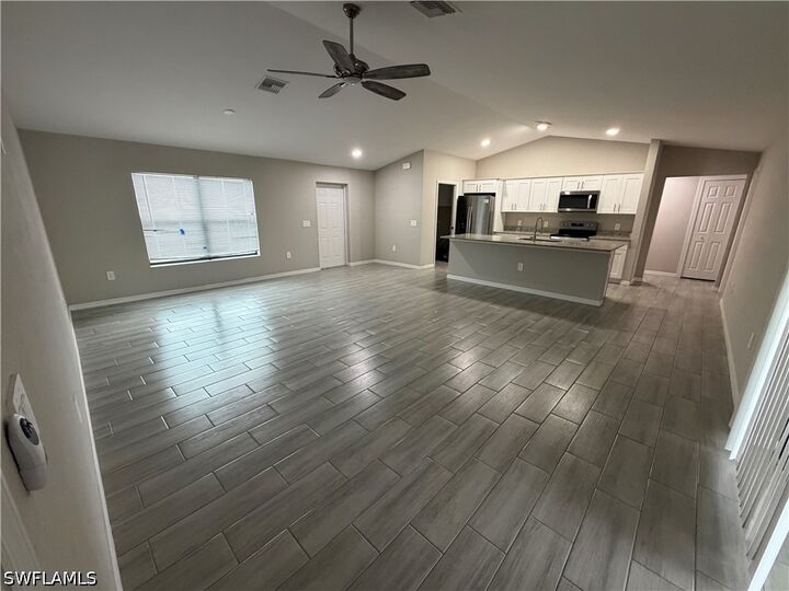 Property Photo:  113 NW 15th Street  FL 33993 